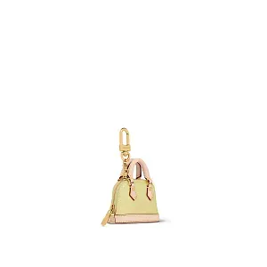 Louis Vuitton Аксессуар для сумки и брелок для ключей Micro Alma Vernis Yellow - фото 2
