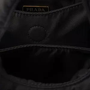 Prada Мини-сумка из стеганого Re-Nylon с бантом - фото 4