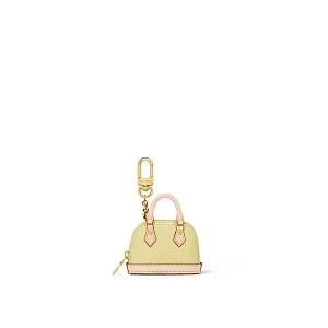 Louis Vuitton Аксессуар для сумки и брелок для ключей Micro Alma Vernis Yellow - фото 1