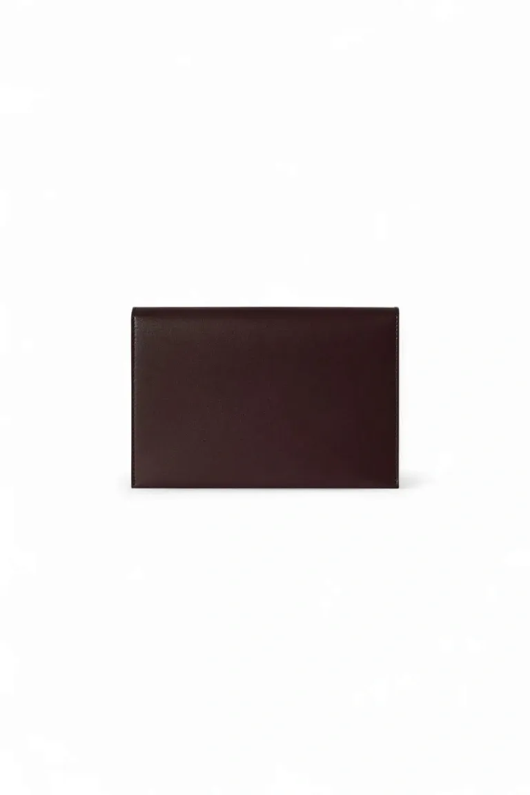 Сумка-пошет Travel Pouch Dark Pine из кожи The Row Amaranto - фото 1